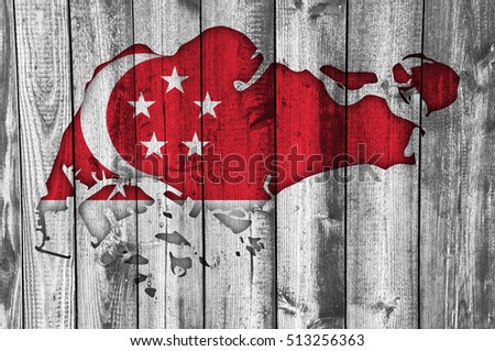 Map and flag of Singapore on weathered wood

