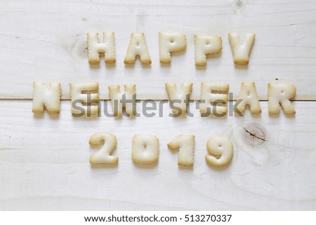 Happy New Year 2019 , romantic background with biscuit made letters.