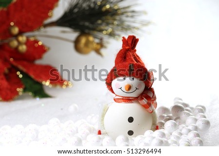 Cute smiling snowman with a winter background