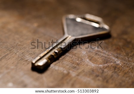 key on wood background