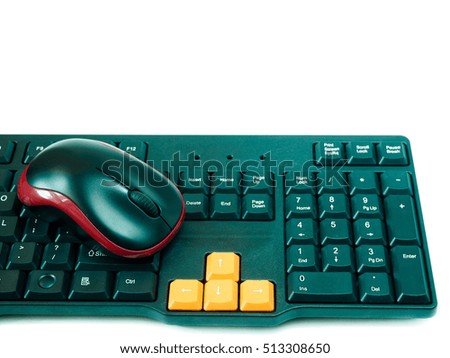 Computer black red mouse and black orange keyboard on white background