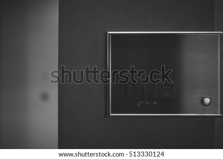 Number table on the door of room in the hotel, shallow focus black adn white