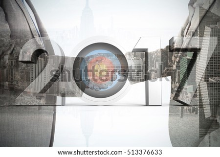 Composite image of number with sports target against composite image of close up on two businesspeople shaking hands
