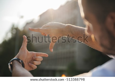Photo Frame Hands Made By A Young Man Royalty-Free Stock Photo #513388798