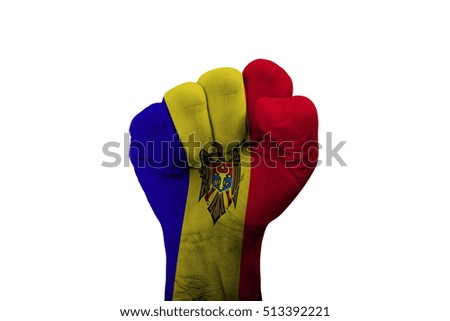 Man hand fist of MOLDOVA flag painted