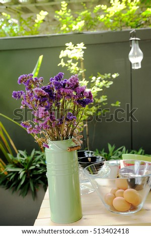 Decorative on the table with dry flowers and cake equipment
