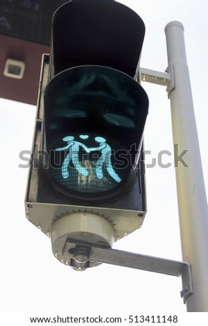 pedestrian traffic light showing green light