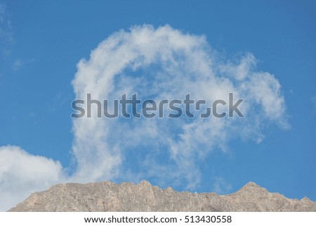 Fantastic white clouds against blue sky