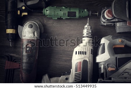 Electric hand tools (screwdriver Drill Saw jigsaw jointer) photo processing: instagram Royalty-Free Stock Photo #513449935