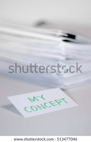 My Concept; Stack of Documents on white desk and Background.
