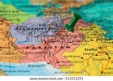 Map of Pakistan with a green pushpin stuck