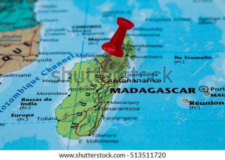 Map of  Madagascar with a red pushpin stuck Royalty-Free Stock Photo #513511720