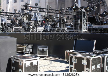 black music equipment with stage lights and console. Royalty-Free Stock Photo #513528256