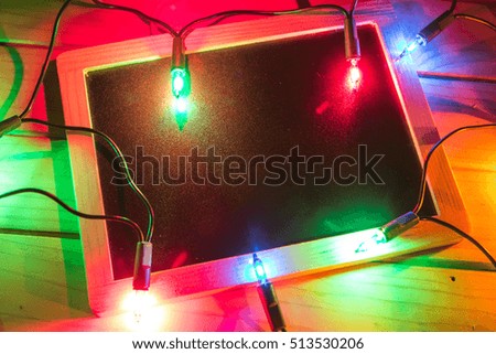 Empty Christmas card with colorful lights. Free space for text