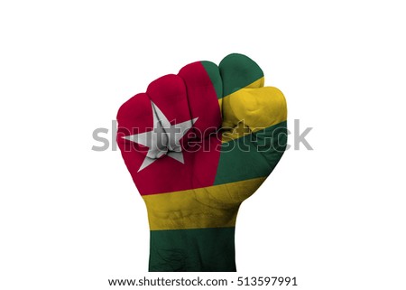 Man hand fist of TOGO flag painted