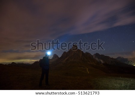 Night sky with stars at dolomites mountains near La Gusela, Passo Giau, Dolomites, Italy