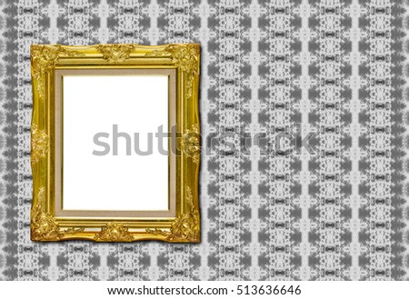 antique golden picture frame on fabric texture