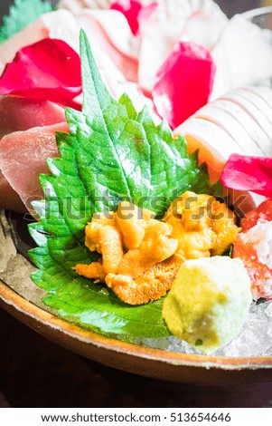 Selective focus point on Sashimi seafood set , Japanese and Healthy food - Dark Processing and Vignetting Effect