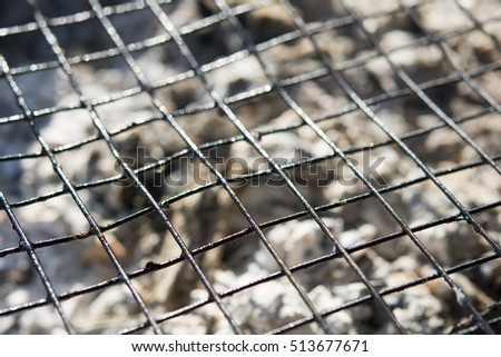 Empty Hot Barbecue Cast Iron Grill With Glowing Charcoal Background