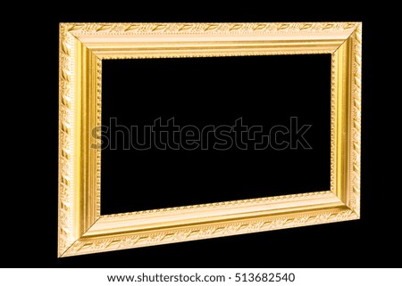 Antique gold frame on black background