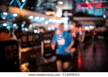 Abstract blurred city people running background 