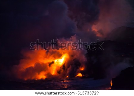 Explosive Lava Clouds at Night Royalty-Free Stock Photo #513733729