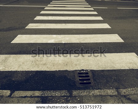 Vintage looking Zebra crossing sign at pedestrian crossroad