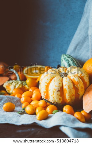Amazing Autumn Orange Background with Fruits and Vegetables on Dark Wooden Rustic Background, Vertical View, Toned Picture