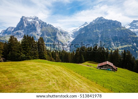 Impressive view of alpine Eiger village. Picturesque and gorgeous scene. Popular tourist attraction. Location place Swiss alps, Grindelwald valley in the Bernese Oberland, Europe. Beauty world.