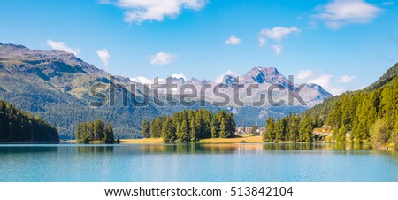 Great view of the azure pond Champfer in alpine valley. Popular tourist attraction. Picturesque and gorgeous scene. Location Swiss alps, Silvaplana village, district of Maloja, Europe. Beauty world.