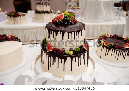 Wedding cake with chocolate and berries