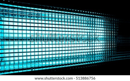 azure blue  white squares arranged in diagonal strong lines with gradient effect against black background, dark grid against white light, close-up of movie illuminant, texture of lights squares