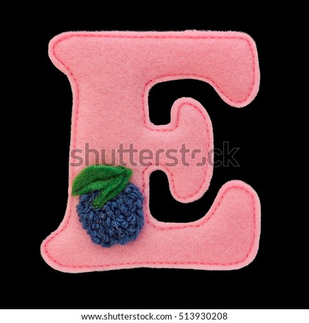 Letter E of the alphabet made of pink felt isolated on black background. Cyrillic (Russian) alphabet set. Font for children with educational pictures