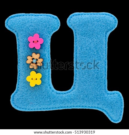 Letter of the alphabet made of blue felt isolated on black background. Cyrillic (Russian) alphabet set. Font for children with educational pictures