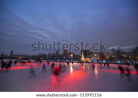 Skating in Montreal Marche Bonsecours Market at dusk. View from the Old Port of Montreal