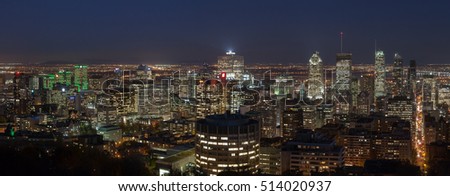 Large panoramic view over the Montreal skyline at night