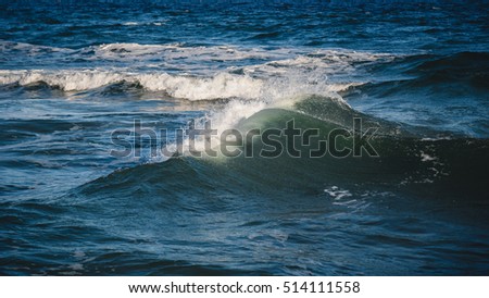Close-up of a beautiful wave. Wave splash details abstract background