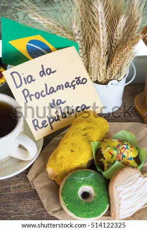 cookies with green and yellow glaze as Brazilian flag colors. cup of coffee and Flag of Brazil, decorative patriotic breakfast - The Proclamation of the Republic text