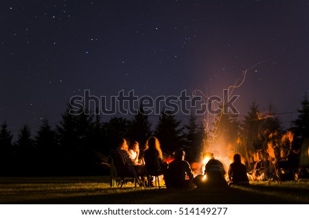 Camp Fire in Summer Royalty-Free Stock Photo #514149277