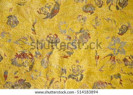 Pattern on old blanket with flowers
