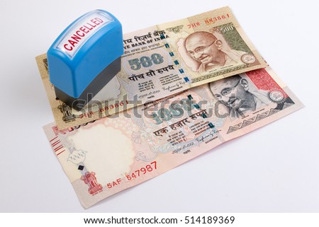 India canceled banknote. India rupee 500 and 1000 banknote declared illegal. 500 and 1000 Rupee note banned. Canceled banknote concept. Mahatma Gandhi on Indian 500, 1000 rupee banknote canceled. Royalty-Free Stock Photo #514189369
