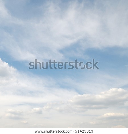 beautiful white fluffy clouds in the blue sky
