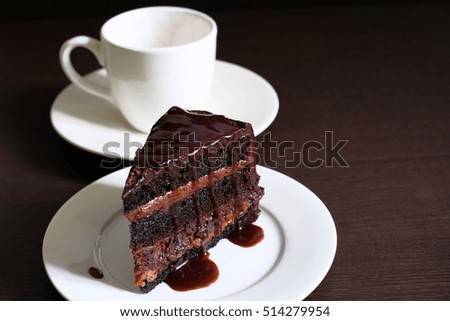 piece of chocolate cake on a dark background,selective focus