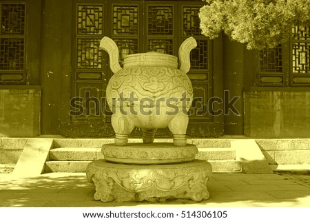 traditional Chinese style stone incense burner, closeup of photo
