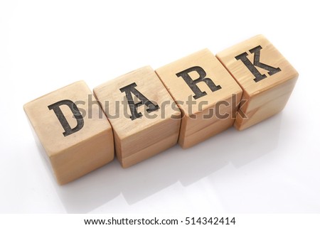 DARK word made with building blocks isolated on white