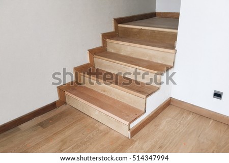 Wood stair interior between contruction Royalty-Free Stock Photo #514347994