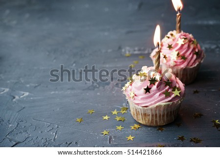 image of sweet cupcakes on gray table 