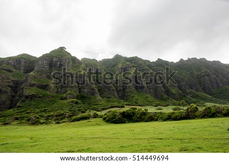 Kualoa Ranch in Oahu, Hawaii.  Many famous television shows and movies, including "Jurassic Park" and "Lost" were filmed in Kualoa Ranch. Royalty-Free Stock Photo #514449694