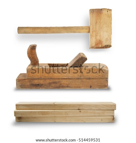 set of hand tools for joinery. Mallet, planer, stack of wooden planks isolated on white background