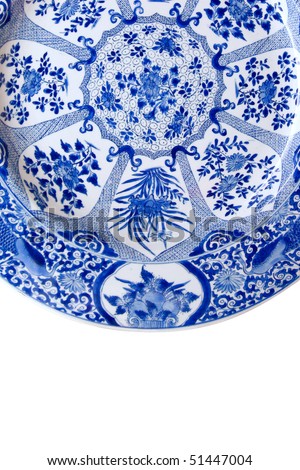 A Qing style hand painted platter. Exotic birds, plants, scrolls in cobalt blue on white porcelain.  white bkgnd. Royalty-Free Stock Photo #51447004